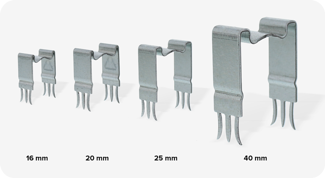 Vier metalen connectors van 16 tot 40 mm