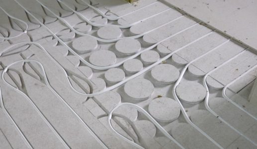 Elektrische vloerverwarming draad op betonvloer